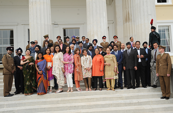 Guests at the grand steps of the Old College building